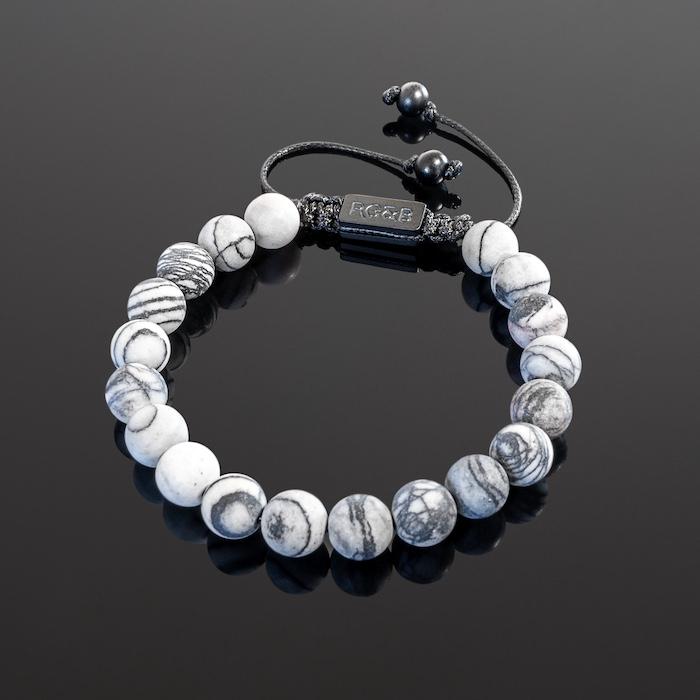 Black Network Bead Bracelet - Our Black Network Stone Bead Bracelet Features Natural Stones, Waxed Cord and Brushed Black Steel Hardware. A Beautiful Addition to any Collection.